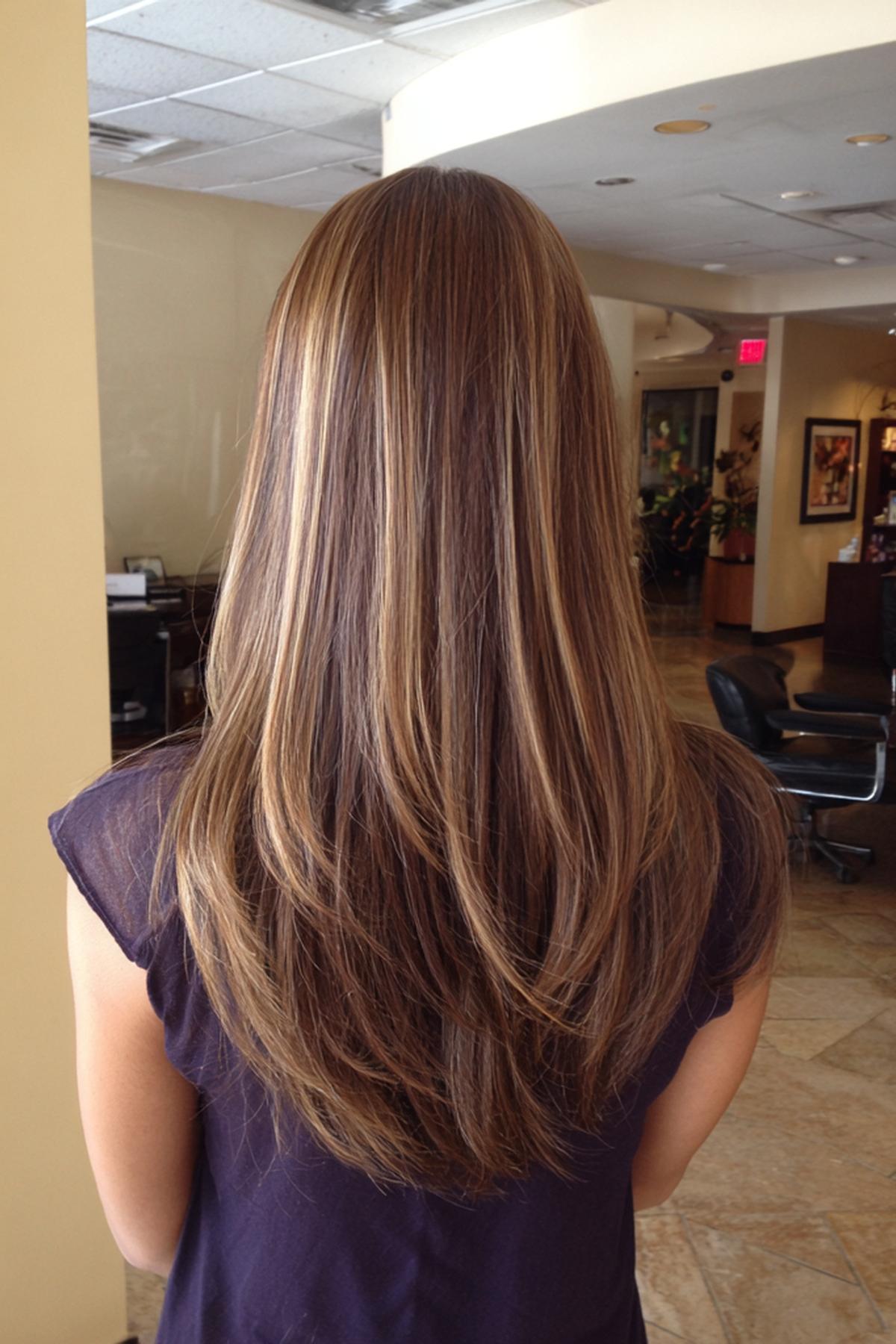 Lang Steil Bruin Haar Met Highlights
