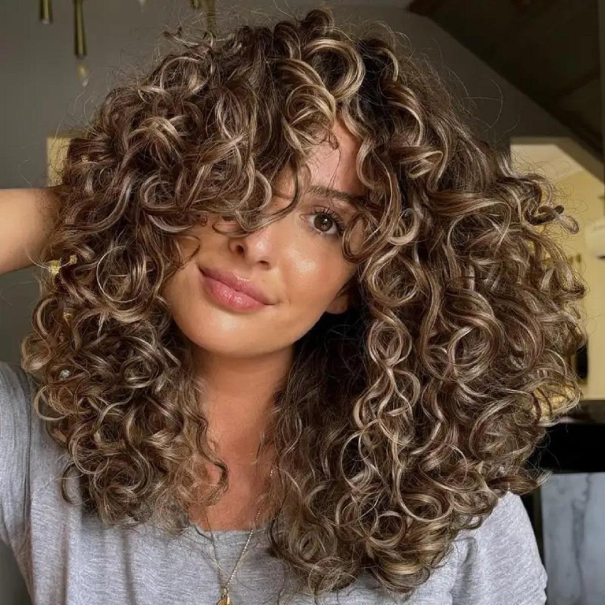 Krullen met highlights