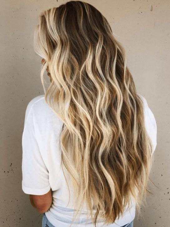 Losse beach waves in lang haar